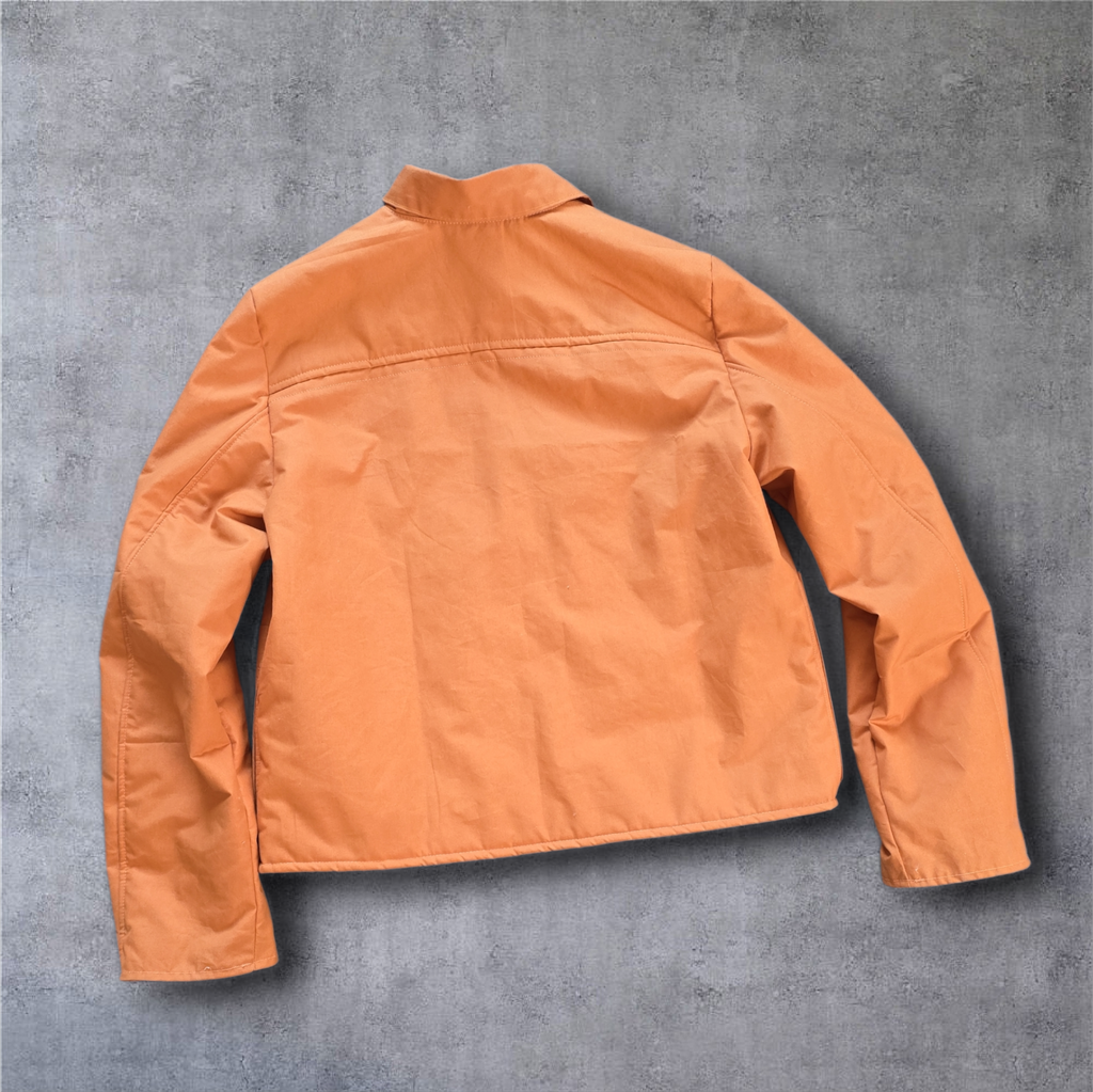Water-repellent waxed cotton jacket.